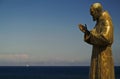 The San Pio statue in front of the sea in the island of Marettimo Royalty Free Stock Photo