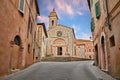 San Quirico d`Orcia, Siena, Tuscany, Italy: the medieval church Collegiata 12th century Royalty Free Stock Photo