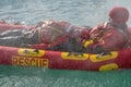 San Rafael, Argentina, november 6, 2020: firefighters in water rescue drill, using canoe and special suits. Aerial view from drone Royalty Free Stock Photo