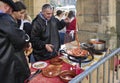 Farmers frying Txistorra in Santo Tomas Fair. San Sebastian, Spain