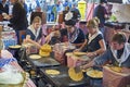 Farmers making talos in fair of Santo Tomas. San Sebastian. Royalty Free Stock Photo