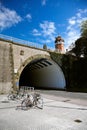 San Sebastian Donostia, Basque country, Spain: deserted city, bike parking near old stone bridge Royalty Free Stock Photo