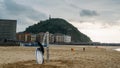 San Sebastian or Donostia is a coastal city and located on the coast of the Bay of Biscay, Spain. Surfer on the coast Royalty Free Stock Photo