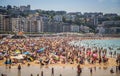 San Sebastian, Spain - August 11 2018: Crowded La Concha beach in San Sebastian in summer Royalty Free Stock Photo
