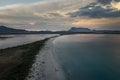 San Teodoro sand beach with lagoon, mountain of island Tavolara and coastline in Sardinia Italy from above during sunset Royalty Free Stock Photo