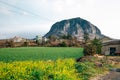 Sanbangsan Mountain with yellow rape flowers in Jeju Island, Korea