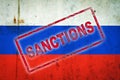 Sanctions. Red stamp, against the background of the flag of Russia. Business. Politics Royalty Free Stock Photo