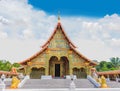 The sanctuary, Wat Wang Kham Temple, Khao Wong District, Kalasin Province, with the blue sky cloud.The public property in Thailand