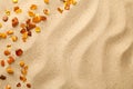 Sand Background With Scattered Ambers Royalty Free Stock Photo