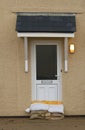 Sand bags protecting house