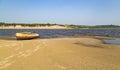 Sand beach. Boat on the shore.