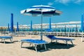 Sand beach with chaise longue and umbrellas Riccione, rimini, it Royalty Free Stock Photo