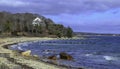 Sand Beach and a distance house in Cape Cod Royalty Free Stock Photo