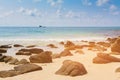 Sand beach and rock over seacoast skyline Royalty Free Stock Photo
