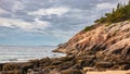 Sand Beach Rocky Cliffs in New England overlooking Water