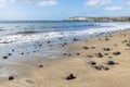 Sand beach with sea stones Royalty Free Stock Photo