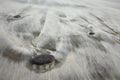 Sand beach with stones