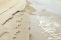 Sand being eroded by a stream Royalty Free Stock Photo