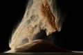 Sand blow like galaxy star in space. Sand dune hill over wind storm and blast dust splash over mountain. Sunshine rain fall on Royalty Free Stock Photo