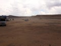 Sand blowing across a beach in the desert