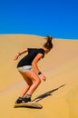 Sand-boarding fun on Atacama Desert, Oasis of Huacachina, Ica Region, Peru