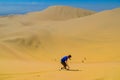 Sand-boarding fun on Atacama Desert, Oasis of Huacachina, Ica Region, Peru