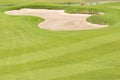 Sand bunker in beautiful golf course Royalty Free Stock Photo