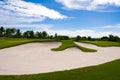 Sand bunker in the golf course Royalty Free Stock Photo