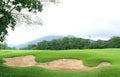 Sand bunker on the golf course Royalty Free Stock Photo