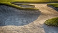 Sand bunker in a golf course on a sunset Royalty Free Stock Photo