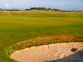 Sand bunker on golf course Royalty Free Stock Photo