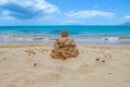 Sand castle. Blue ocean wave on sandy beach. Beach in sunset summer time. Beach landscape. Tropical seascape, calmness Royalty Free Stock Photo