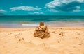 Sand castle. Sea background, nature of tropical summer beach with rays of sun light. Sand beach, sea water with copy Royalty Free Stock Photo