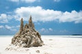 Sand castle on tropical white sand beach in Maldives. Holiday concept with sandcastle on sand castle on seaside Royalty Free Stock Photo