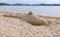 Sand castle whale statue fish ocean lake Royalty Free Stock Photo