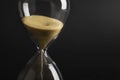 Sand clock , Hourglass as time passing on isolated black background , Life time concept Royalty Free Stock Photo