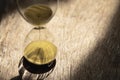 Sand clock , Hourglass as time passing on wooden background , Life time concept Royalty Free Stock Photo