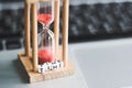 Sand clock timer on laptop Royalty Free Stock Photo