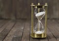 Sand clock on wood