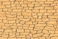 Sand color light yellow old stone brick wall ancient texture background Royalty Free Stock Photo