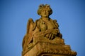 Sand coloured statue of mythical beast, Chatsworth, Derbyshire.