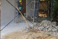 Sand, crushed stones and bloom with scaffold steel in building construction site. Royalty Free Stock Photo