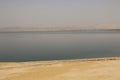 Sand, Dead Sea and mountains in the background, Dead Sea, Jordan