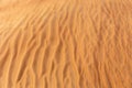 Sand dune close-up texture with ripples and wrinkles, United Arab Emirates