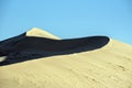Shadow Curves along Desert Sand Dunes Royalty Free Stock Photo