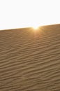 Sand dune with flare Royalty Free Stock Photo