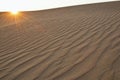 Sand dune with flare Royalty Free Stock Photo