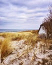 Sand dune with house and view of the Baltic Sea. Ahrenshoop Royalty Free Stock Photo