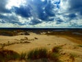 Sand dune landscape with cloudy sky in Rabjerg Mile Denmark Royalty Free Stock Photo