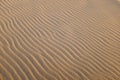 Sand dune with multiple waves formed by wind.